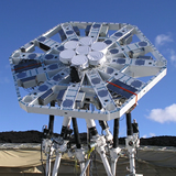 The first phase of AMiBA consisted of seven 0.6m antennas close-packed in the center of the 6m platfor