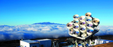 The second phase of AMiBA consisting of thirteen 1.2m antennas was completed at the end of 2009